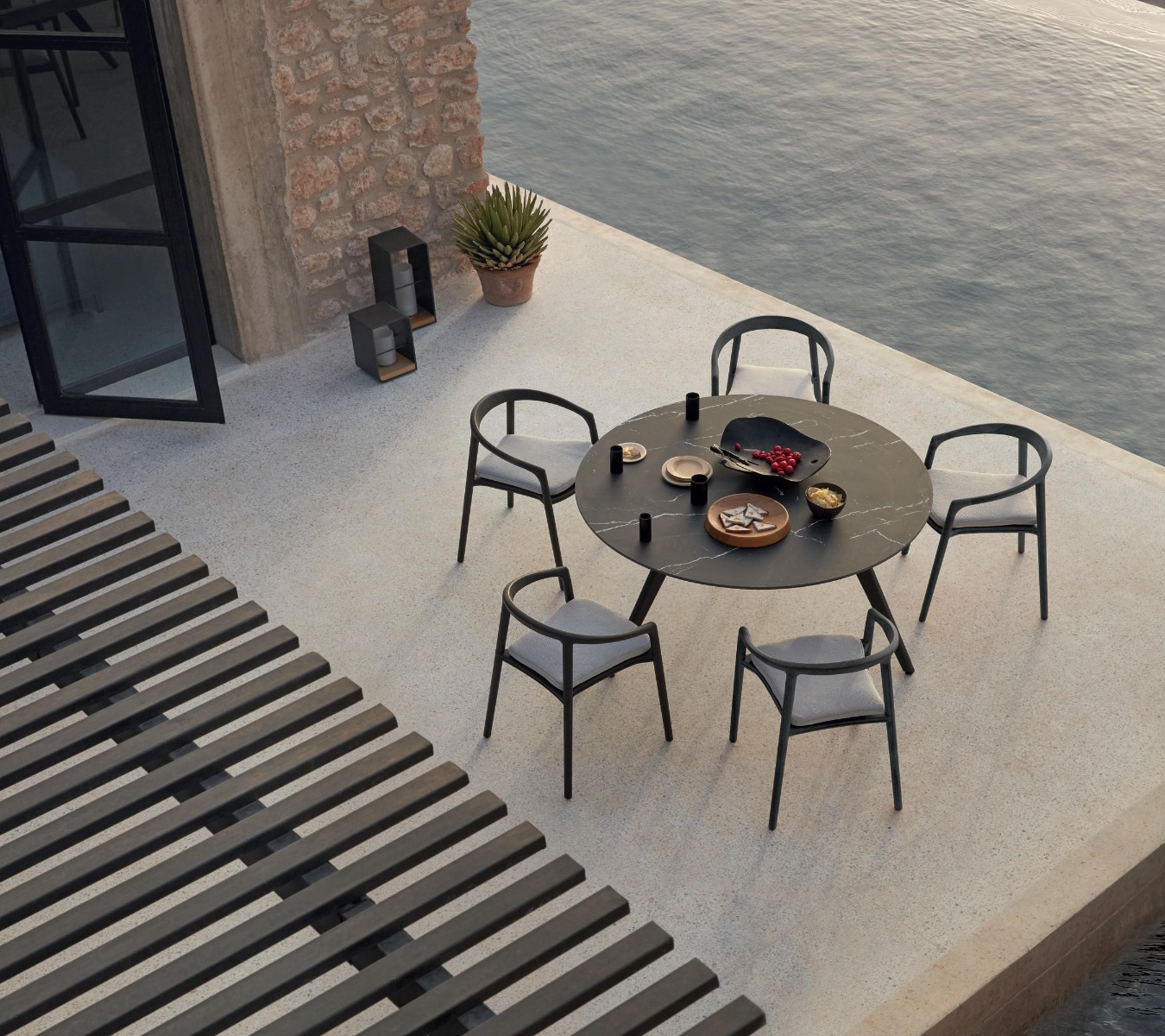 Manutti Torsa Table Collection